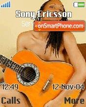 Ebony girl with orange guitar es el tema de pantalla